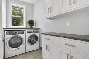 clean laundry room with appliances