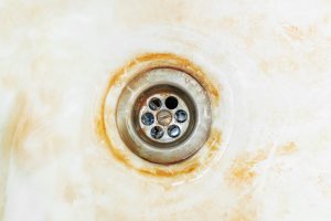 Iron Stains around bathtub drain