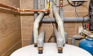 water heater overflow pipe leaking
